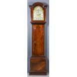 A George III mahogany longcase clock by Thomas Lyon of London, the 12ins arched brass dial with