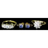 Two 9ct gold mounted and cubic zirconia rings, one of flowerhead pattern (size S and V), and a