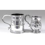 A George V silver Britannia standard tankard with reeded mounts, moulded girdle and S-scroll handle,