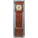 An 18th Century oak longcase clock by William Kipling of London, the 12ins square brass dial with