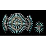 A 20th Century Native American silvery metal and turquoise "petit point" stiff bangle by J.S.