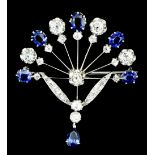 A modern 18ct white gold mounted sapphire and diamond brooch of fan and drop pendant pattern, set