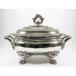 A good George IV silver oval two-handled tureen and cover, the slightly domed cover with cast lion