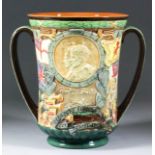 A Royal Doulton pottery two-handled loving cup commemorating the coronation of King George VI and