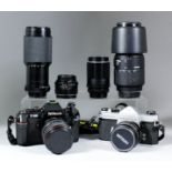 A collection of cameras, lenses and accessories, including - a Nikon F-301, body with 28-70mm