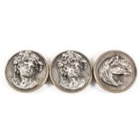 Two brass mounted and silver plated circular dress studs cast with the bust of a young woman, one