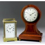 An early 20th Century French mahogany cased mantel clock retailed by J. W. Benson Ltd. of London,