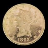 A USA 1893 gold Coronet Eagle (weight 16.7 grammes - fine with slight scuff marks)