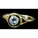 An 18ct gold mounted clear gem stone (paste) ring, set within halo setting (approximate