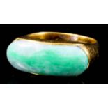 A gentleman's gold coloured metal mounted and jade ring, set with oblong stone, 10mm x 23mm (size