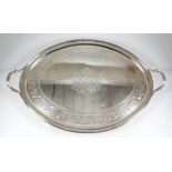 A good George III silver oval two-handled tray, the centre engraved with oval panel, full armorial