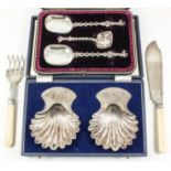 A Victorian silver three-piece fruit serving set with rectangular bowls, cast handles with