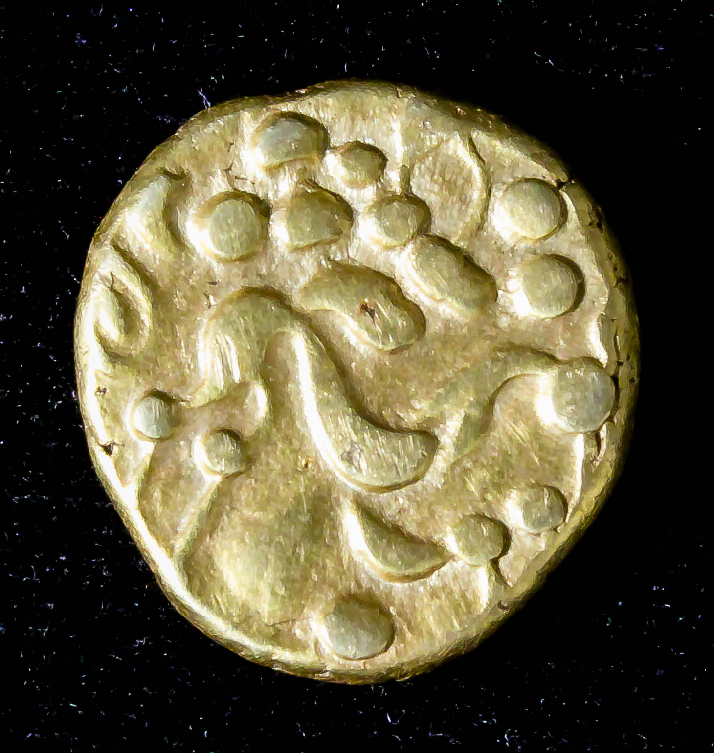 A Gallo-Belgic C biface gold Stater (circa 100-60 B.C.), (weight 6.5 grammes - approximately 15mm