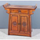 A 20th Century Korean panelled hardwood pier cabinet with curved ends and flush panelled top, fitted