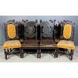 A set of six late Victorian oak high back dining chairs with scroll carved crest rails, on bobbin