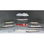 A collection of 102 diecast model ships, including - R.M.S Queen Mary and R.M.S Titanic, scale
