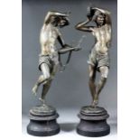 Anna Carrier (19th Century) - Pair of bronze figures of musicians, on turned wood ebonised bases,