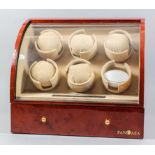 A Pangaea gloss maple effect six watch automatic winder case, with drawer under, 14.5ins x 9ins x