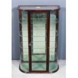 A mahogany framed bow fronted table top display cabinet retailed by George Taylor & Co, 16
