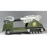 A Marx Toys Mobile Long Range Atomic Cannon Truck with electronically operated push button controls,