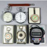 A Minerva "Super8" cased stopwatch with 2ins printed dial, a Heuer "Microsplit" 1040 electronic