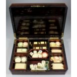 A late 19th Century Continental rosewood rectangular games box, with canted corners and brass inlay,