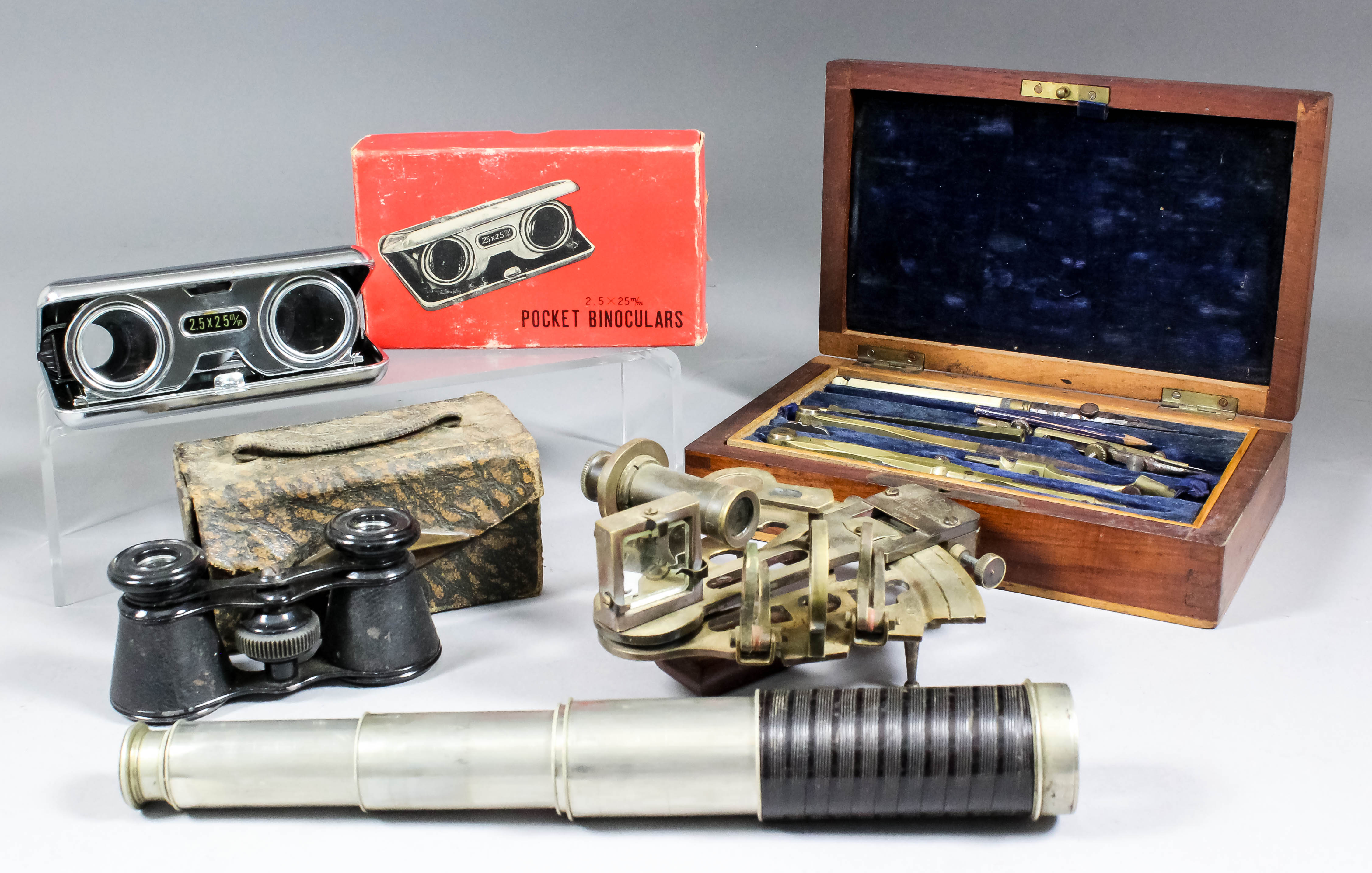 A mixed collection of scientific instruments, including - a miniature sextant by Kelvin & Hughes