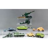 A large collection of diecast military vehicles, including - tanks, armoured cars, field guns and