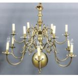 A brass twelve light electrolier in the "17th Century Dutch" manner, the bulbous knopped column with