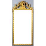 A Dutch gilt rectangular wall mirror with fretted and carved apron in the form of a basket of