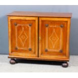 A 19th Century Anglo-Chinese coin collector's cabinet in rosewood and ebony, the interior fitted