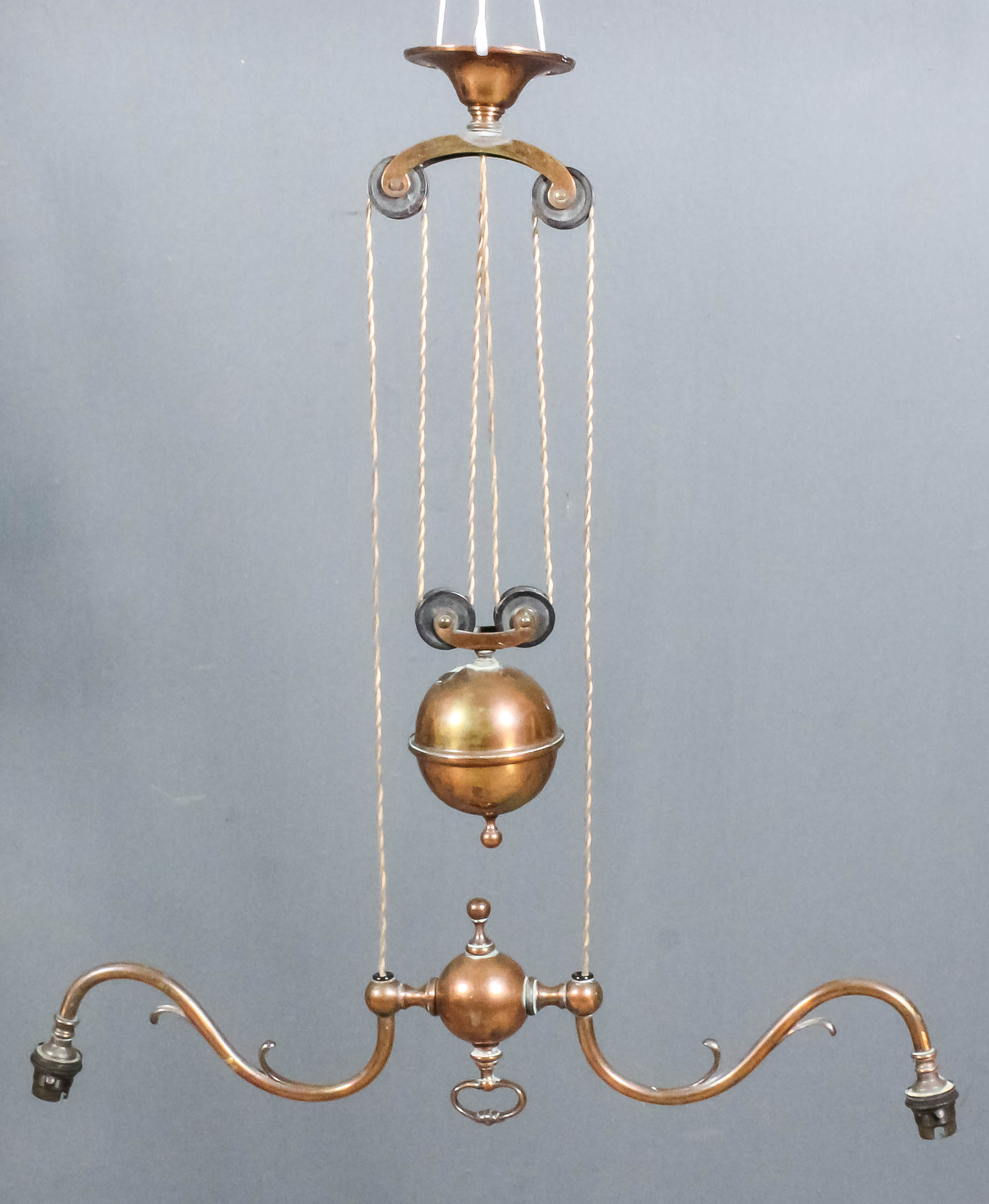 A late 19th/early 20th Century copper plated brass push and pull two light electrolier, 23.75ins