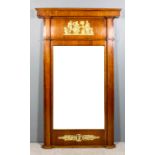 A 19th Century French mahogany and gilt brass rectangular pier glass with moulded and angular