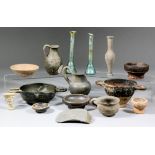 A small collection of early pottery, including - Greek black Atticware pottery skyphos, Greek