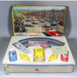 A collection of Tri-ang Toys, including - Junior Car Park, 30.5ins wide, a garage, 19ins wide and