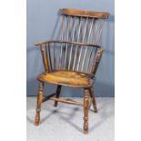 A 19th Century elm and fruitwood stickback Windsor armchair, with plain spindles to the back, on