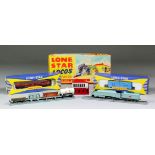 A Lone Star "000" gauge railway layout with various buildings, equipment, etc, and a selection of