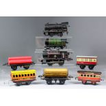 A collection of Hornby 'O' gauge trains, including - locomotive No. 82011, locomotive No. 60199, a