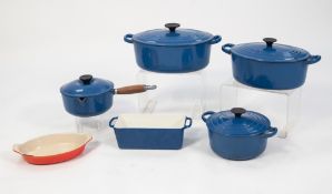 FOUR PIECES OF LE CREUSET BLUE ENAMELLED COOK WARE, comprising: GRADUATED PAIR OF OVAL TWO HANDLED