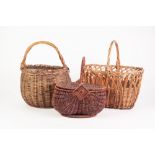 ORBICULAR WICKER BASKET, with loop handle, 14 ½" (37cm) high overall, a/f, together with ANOTHER