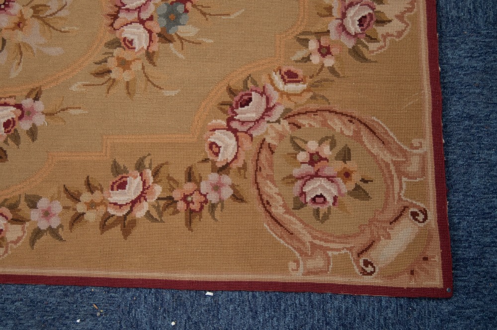 FRENCH TAPESTRY RUG, with an oval centre medallion on roses, rose border and spandrels, on buff - Image 3 of 3