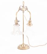 EARLY TWENTIETH CENTURY FRENCH BRASS TWIN LIGHT ADJUSTABLE TABLE LAMP, with scroll arms, moulded