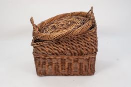 PAIR OF WICKER OBLONG, TWO DIVISION OPEN BASKETS, 8 ½" (21.6cm) high, 22" x 16" (56cm x 40.7cm)