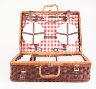 IKEA OBLONG WICKER PIC-NIC HAMPER FOR FOUR PERSONS, with leather fittings, together with a SET OF