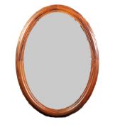 MOULDED MAHOGANY FRAMED OVAL WALL MIRROR, 31" x 23" (78.7cm x 58.4cm)