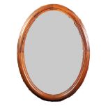 MOULDED MAHOGANY FRAMED OVAL WALL MIRROR, 31" x 23" (78.7cm x 58.4cm)