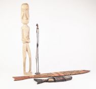 AFRICAN CARVED SOFTWOOD STYLISED FIGURE, modelled standing, 24" (61cm) high, together with ANOTHER