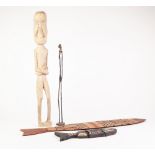 AFRICAN CARVED SOFTWOOD STYLISED FIGURE, modelled standing, 24" (61cm) high, together with ANOTHER