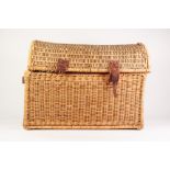 DOME TOP WICKER TRUNK, with leather fittings and side handles, 18 ½" (47cm) high, 18 ½" x 17" (