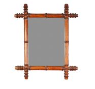 BAMBOO PATTERN TURNED MAHOGANY FRAMED WALL MIRROR, the oblong plate within a frame with crossed